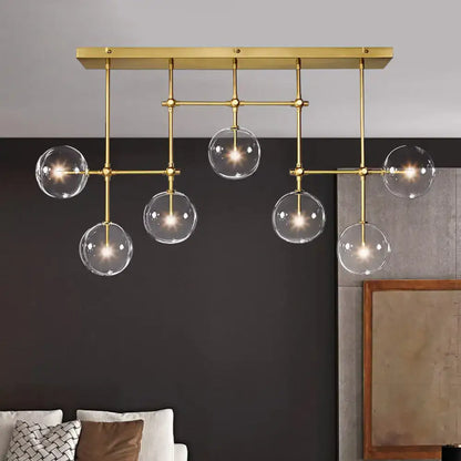 Modern brass and black clear glass sphere ceiling light dining room