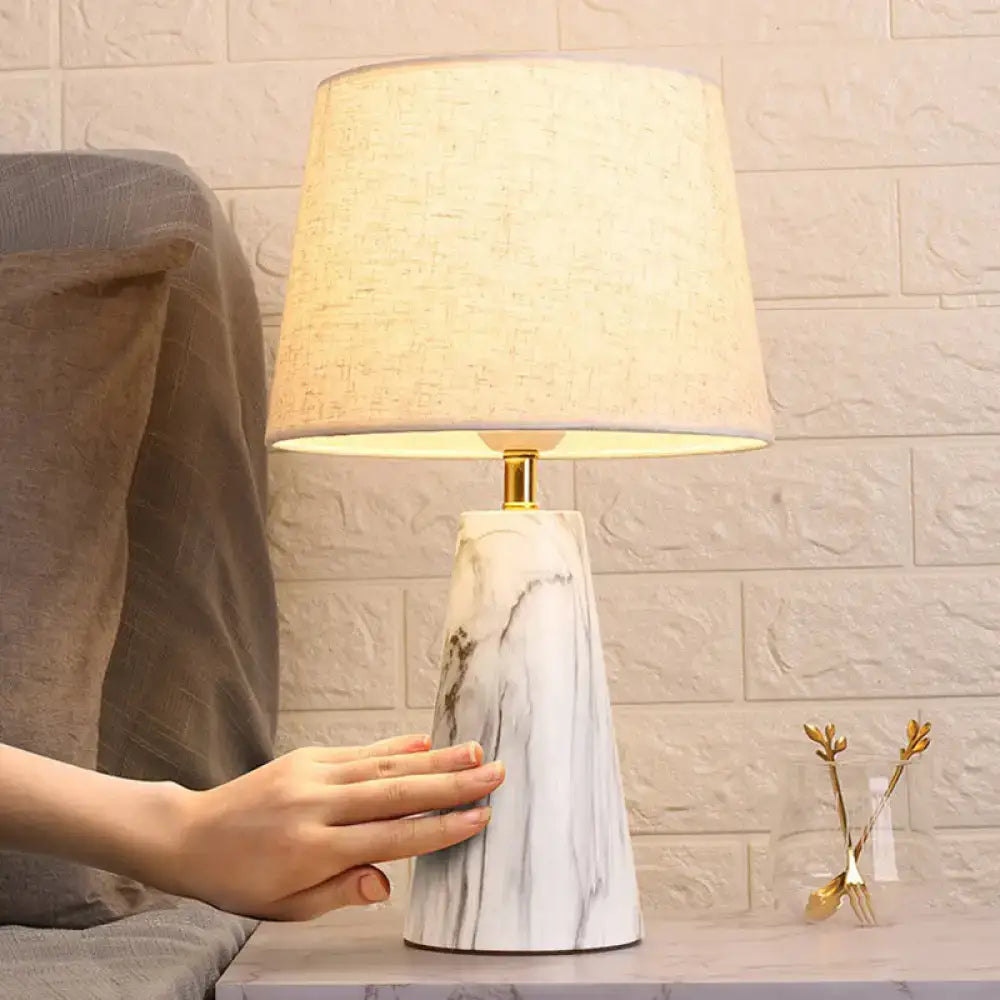 White marble and beige fabric tapered table light bedroom lamp