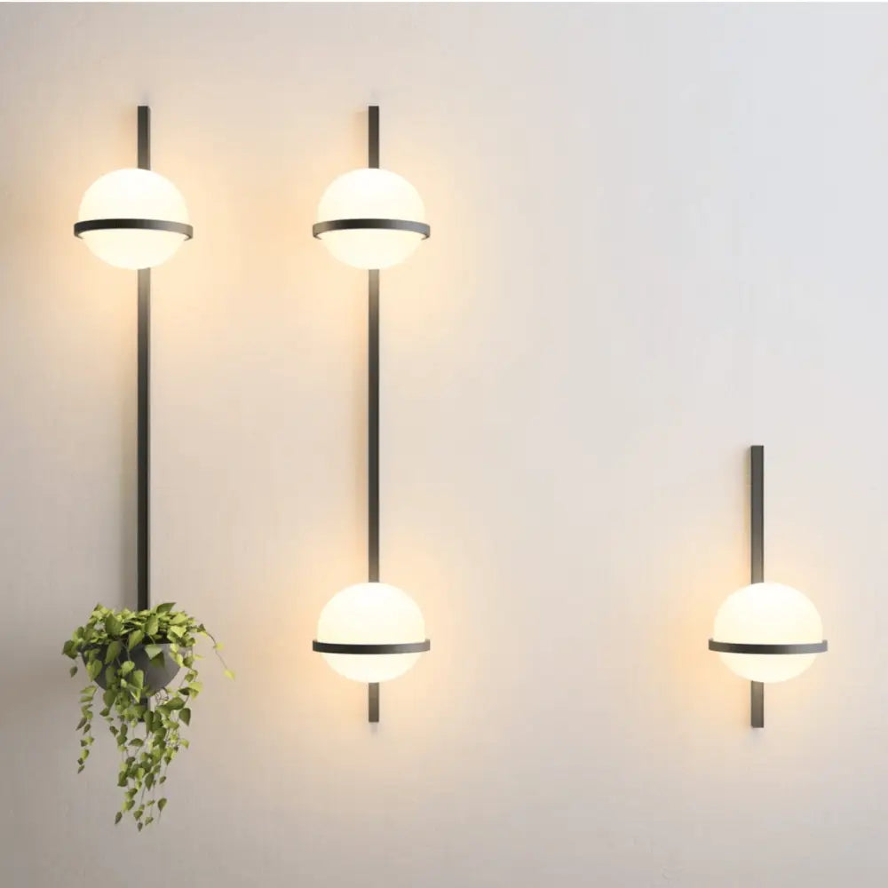 Modern black nordic planter light sconce with glass globes bedroom