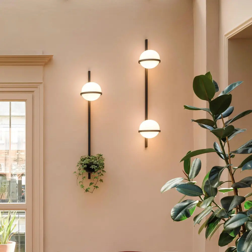Modern black nordic planter light sconce with glass globes bedroom