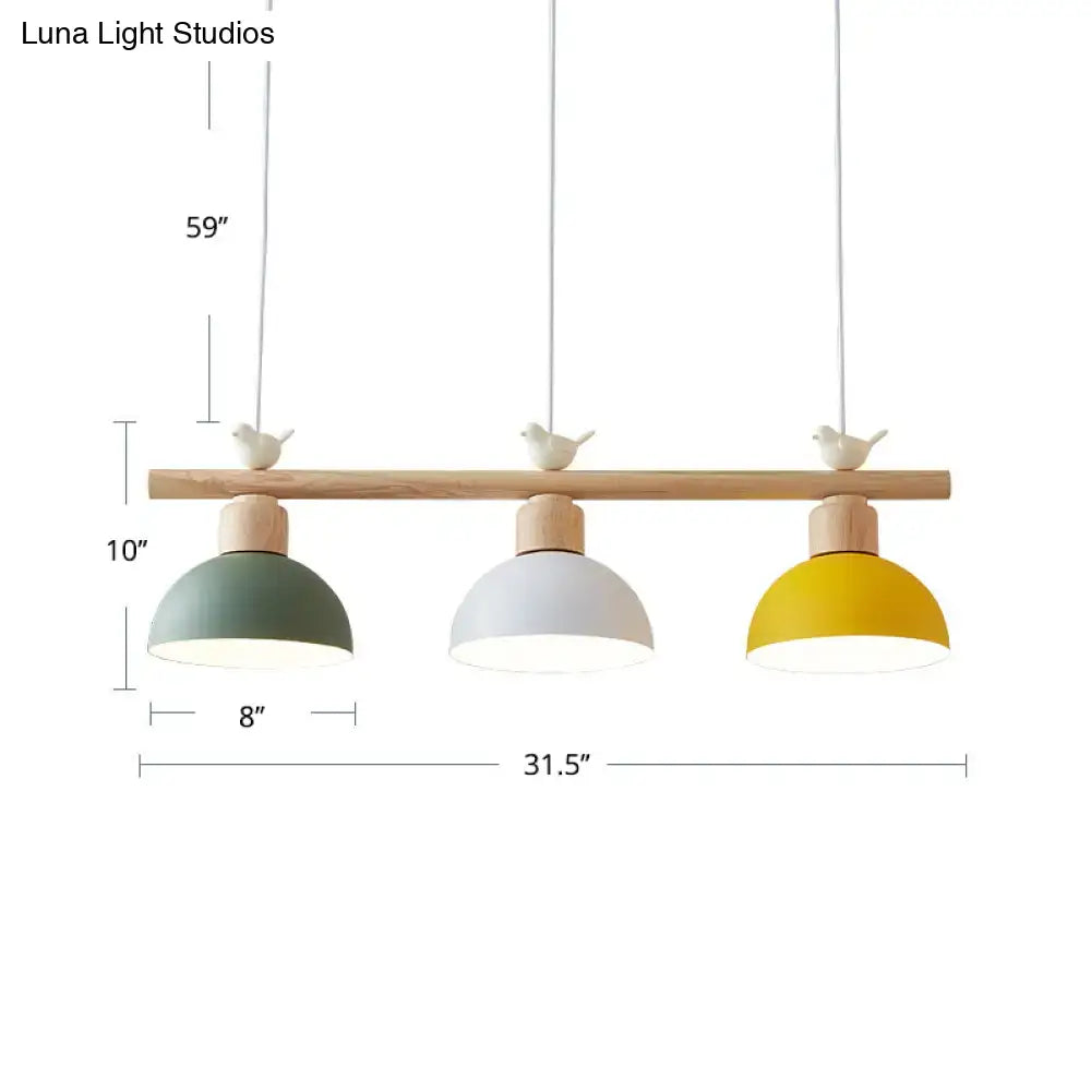 Minimalist wood and white bird hanging island light dining room