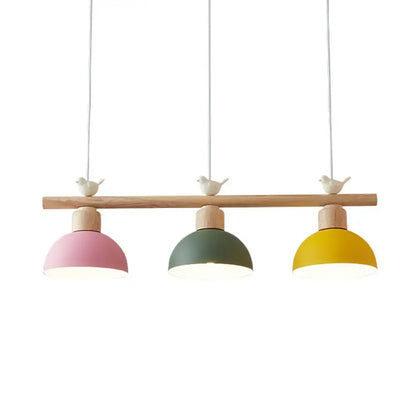 Minimalist wood and white bird hanging island light dining room