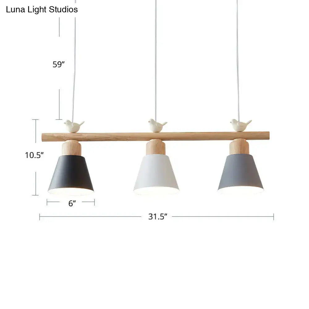 Minimalist wood and white bird hanging island light dining room