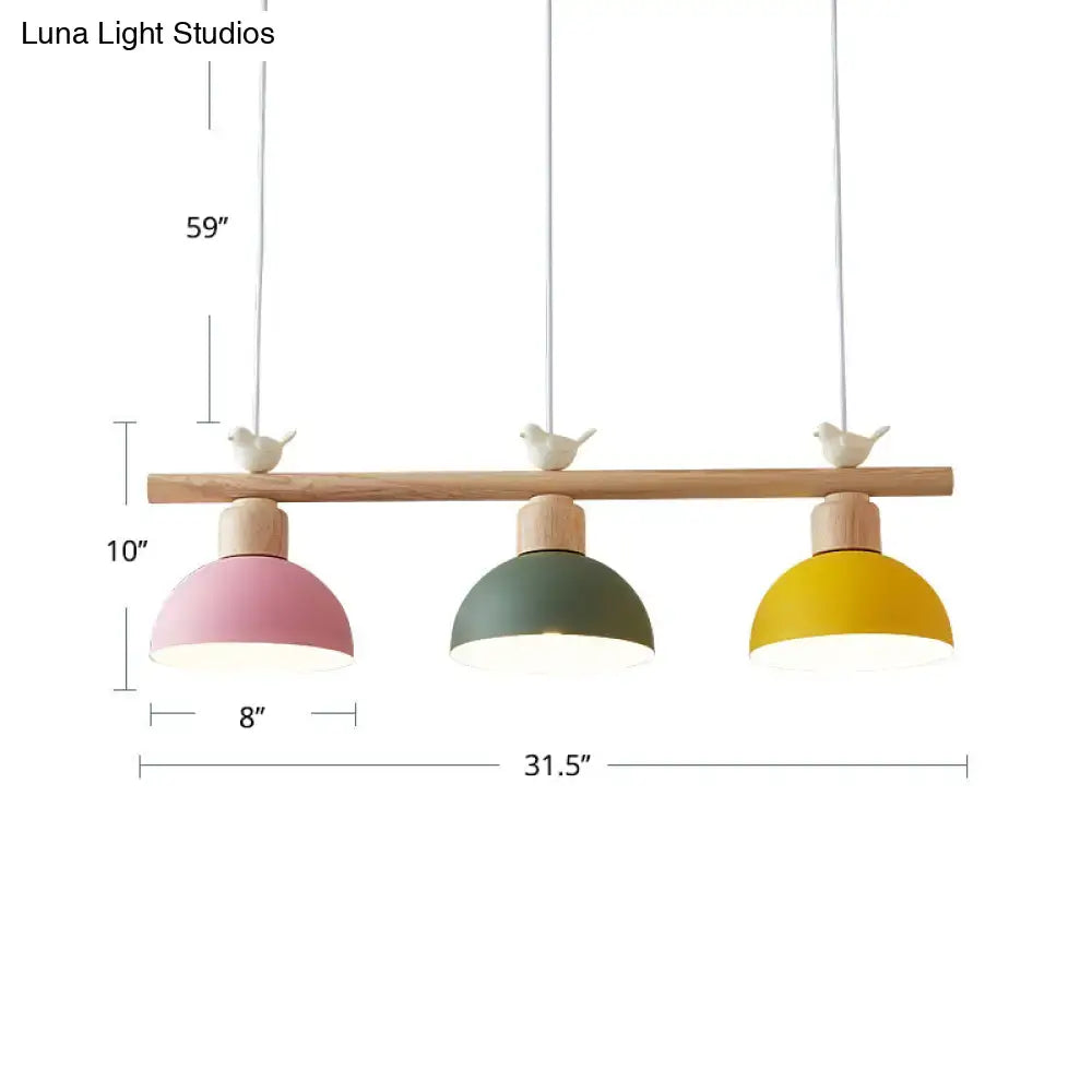 Minimalist wood and white bird hanging island light dining room