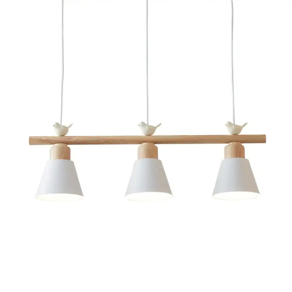Minimalist wood and white bird hanging island light dining room