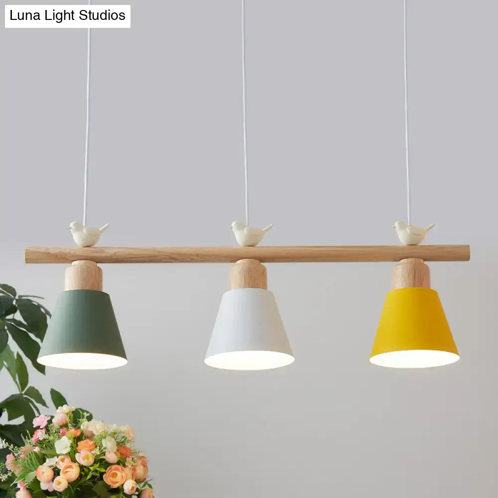 Minimalist wood and white bird hanging island light dining room