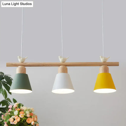 Minimalist wood and white bird hanging island light dining room
