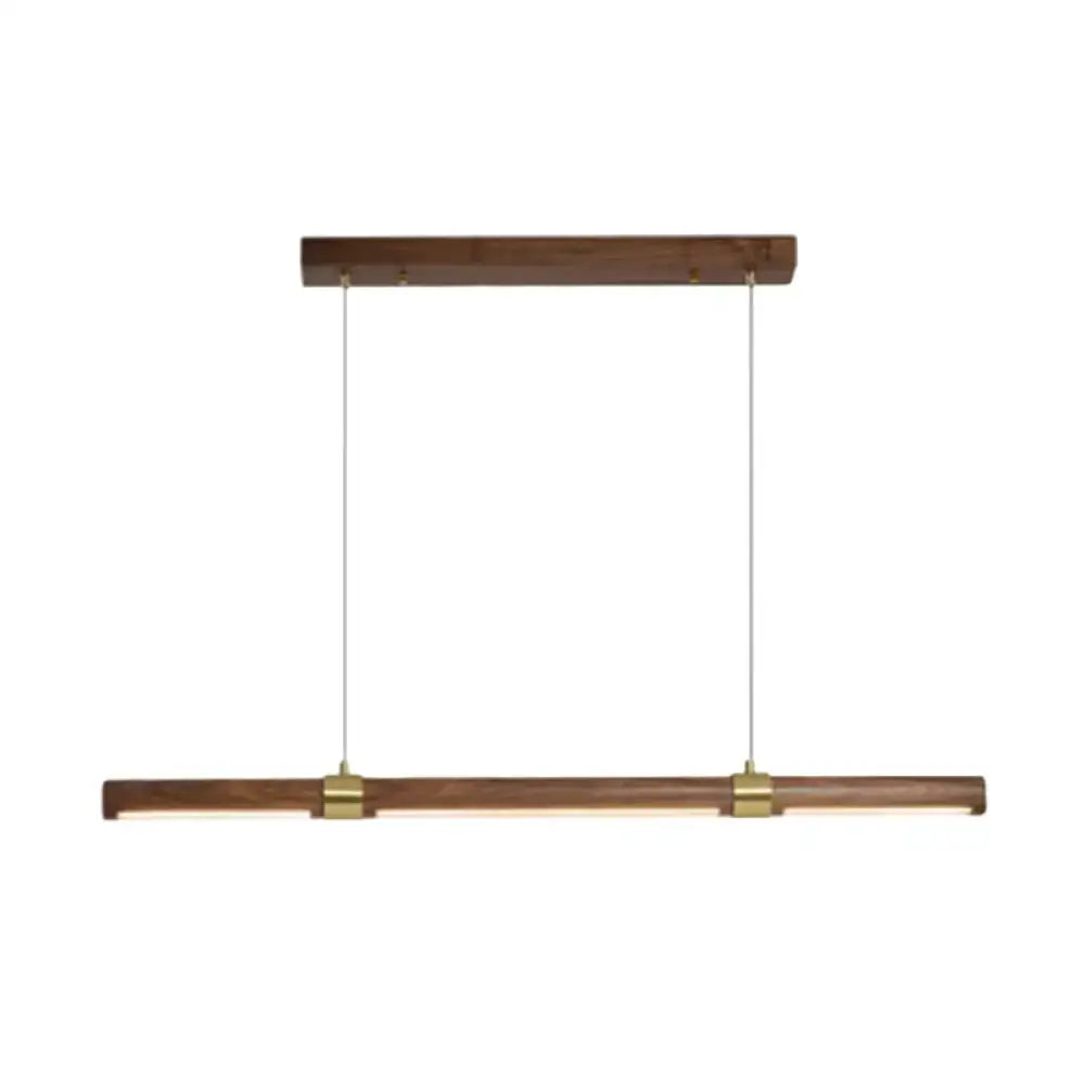 Modern wood island pendant light with brass accents dining room