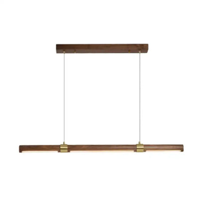 Modern wood island pendant light with brass accents dining room