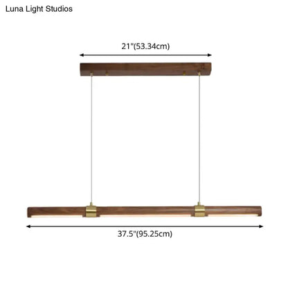 Modern wood island pendant light with brass accents dining room