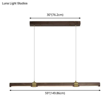 Modern wood island pendant light with brass accents dining room