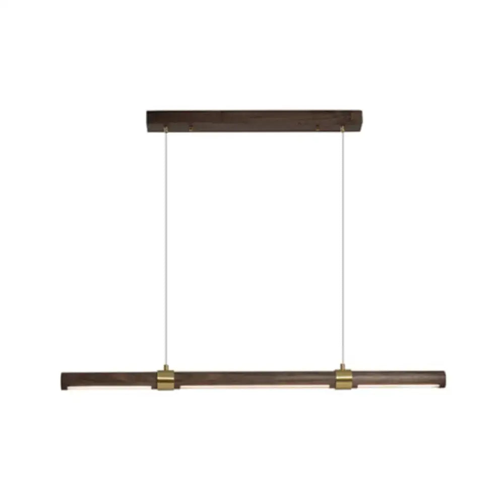 Modern wood island pendant light with brass accents dining room