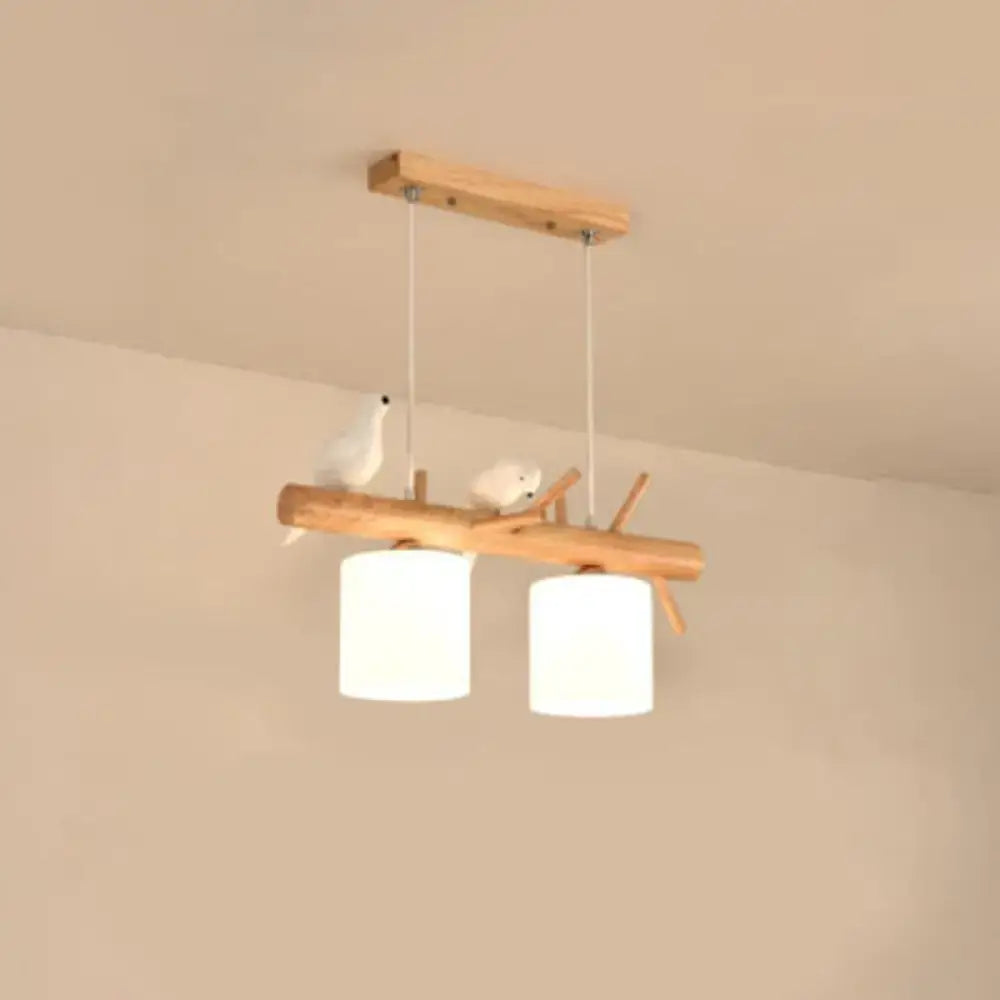 Nordic wood pendant light with resin bird decor – dining room glass