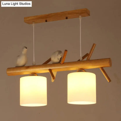 Nordic wood pendant light with resin bird decor – dining room glass