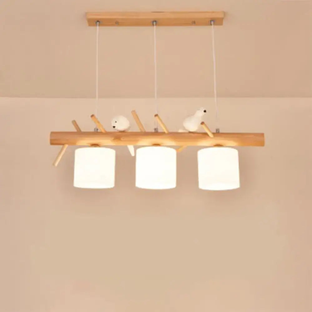 Nordic wood pendant light with resin bird decor – dining room glass
