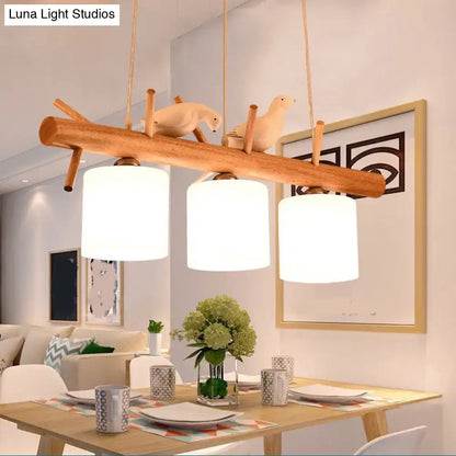 Nordic wood pendant light with resin bird decor – dining room glass