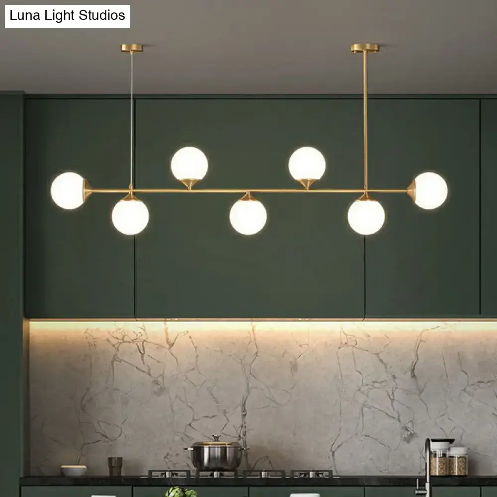 Modern gold opaline glass ball pendant light for dining room island