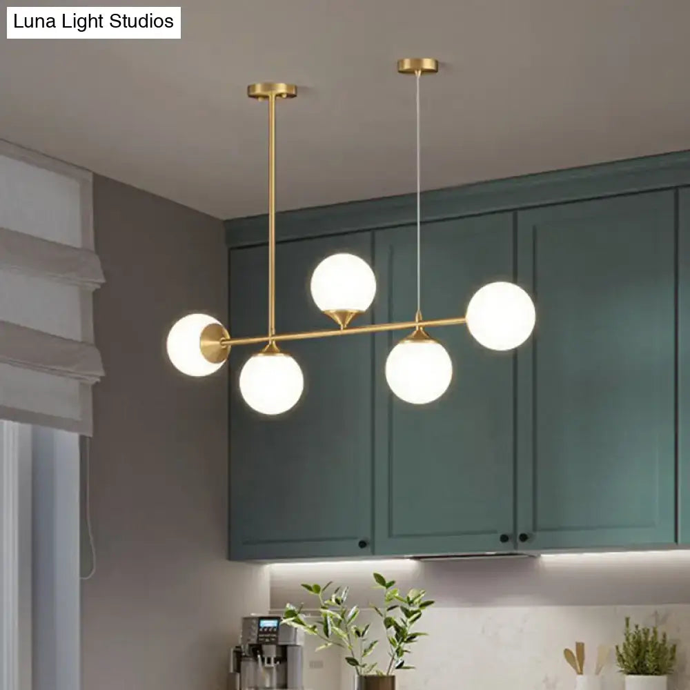 Modern gold opaline glass ball pendant light for dining room island