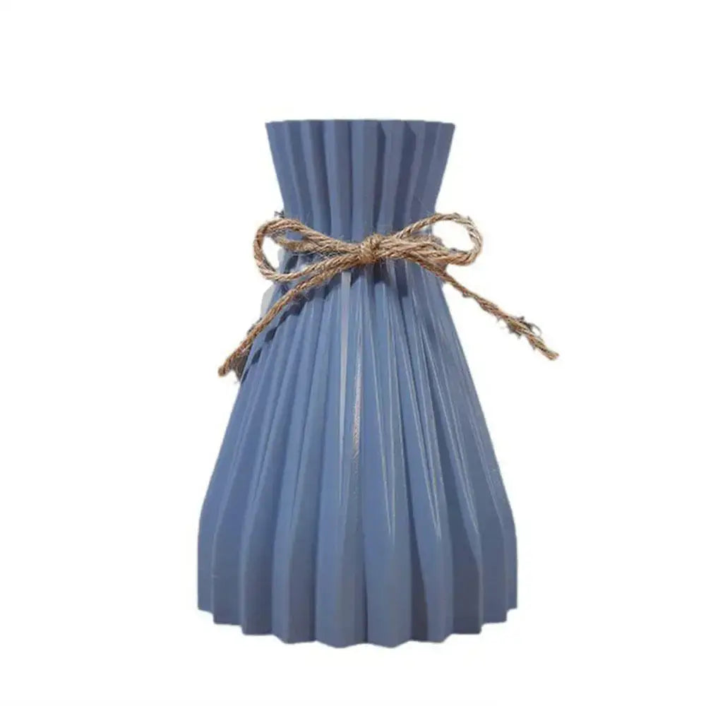 Origami style pink blue and white plastic flower vase living room