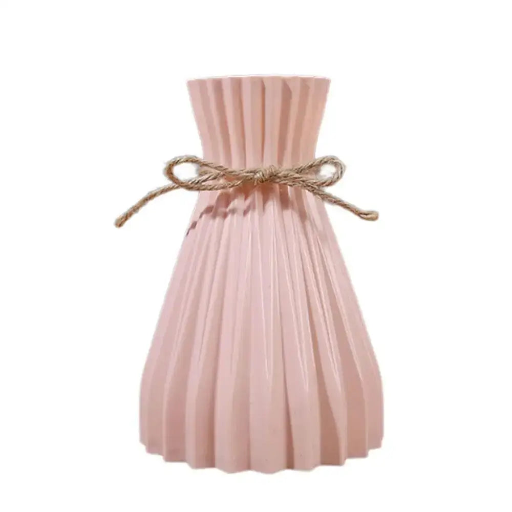 Origami style pink blue and white plastic flower vase living room