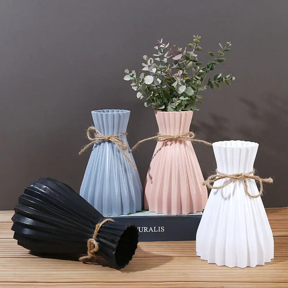 Origami style pink blue and white plastic flower vase living room
