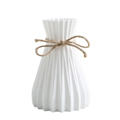 Origami style pink blue and white plastic flower vase living room