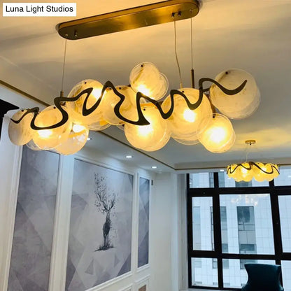 Postmodern gold and glass circle pendant light for dining room