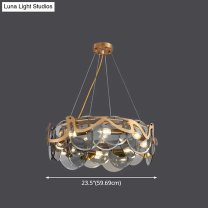 Postmodern gold and glass circle pendant light for dining room