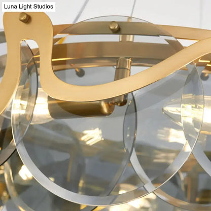 Postmodern gold and glass circle pendant light for dining room