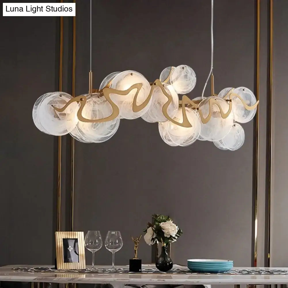 Postmodern gold and glass circle pendant light for dining room