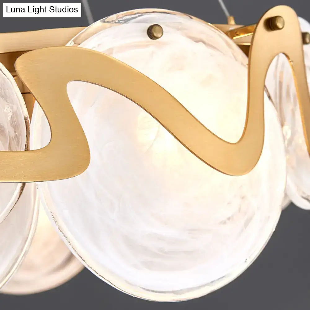Postmodern gold and glass circle pendant light for dining room