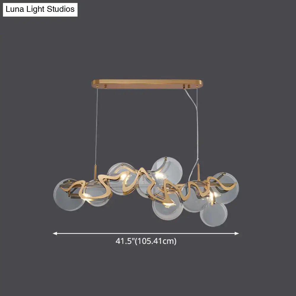 Postmodern gold and glass circle pendant light for dining room