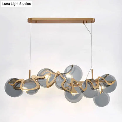 Postmodern gold and glass circle pendant light for dining room