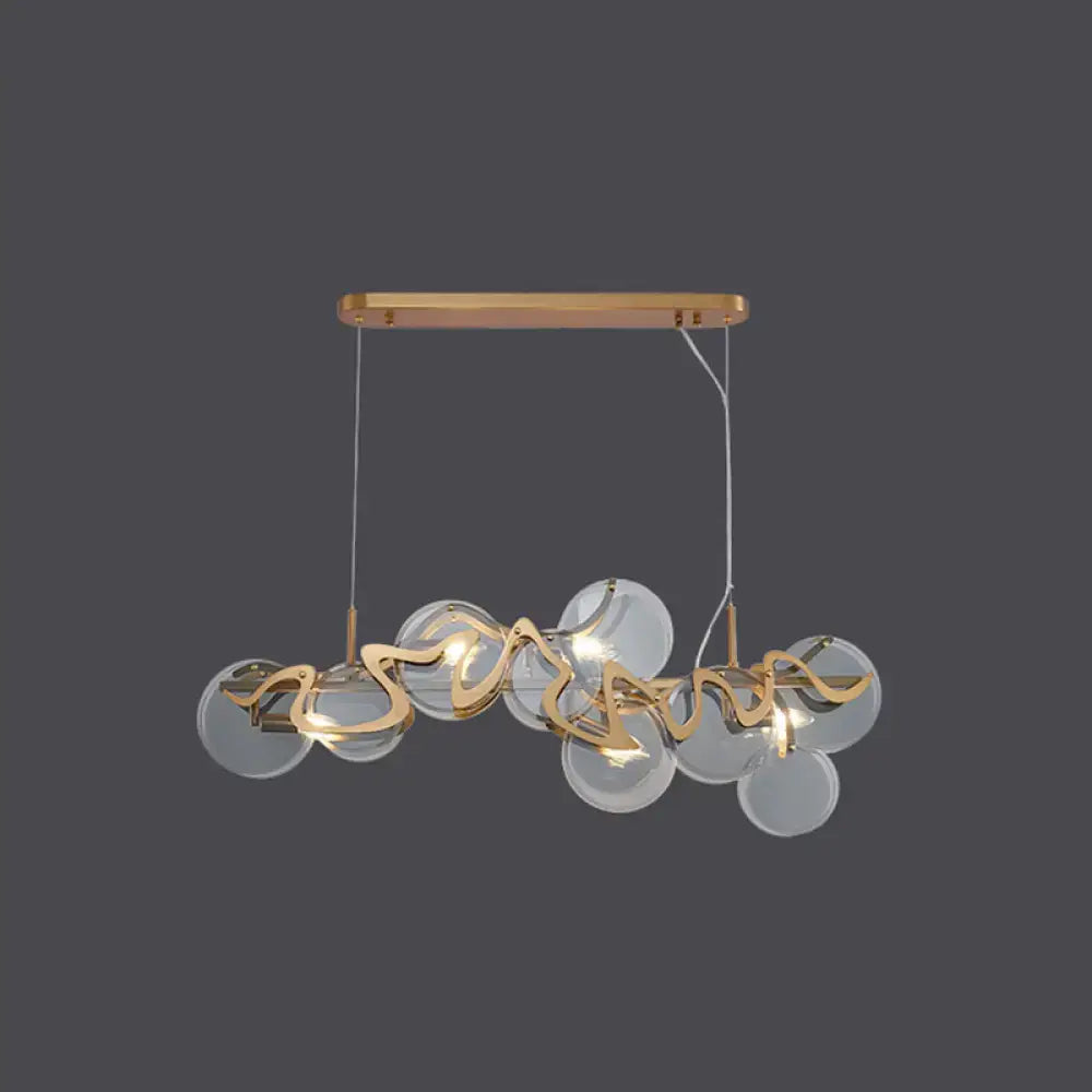 Postmodern gold and glass circle pendant light for dining room