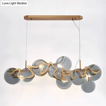 Postmodern gold and glass circle pendant light for dining room