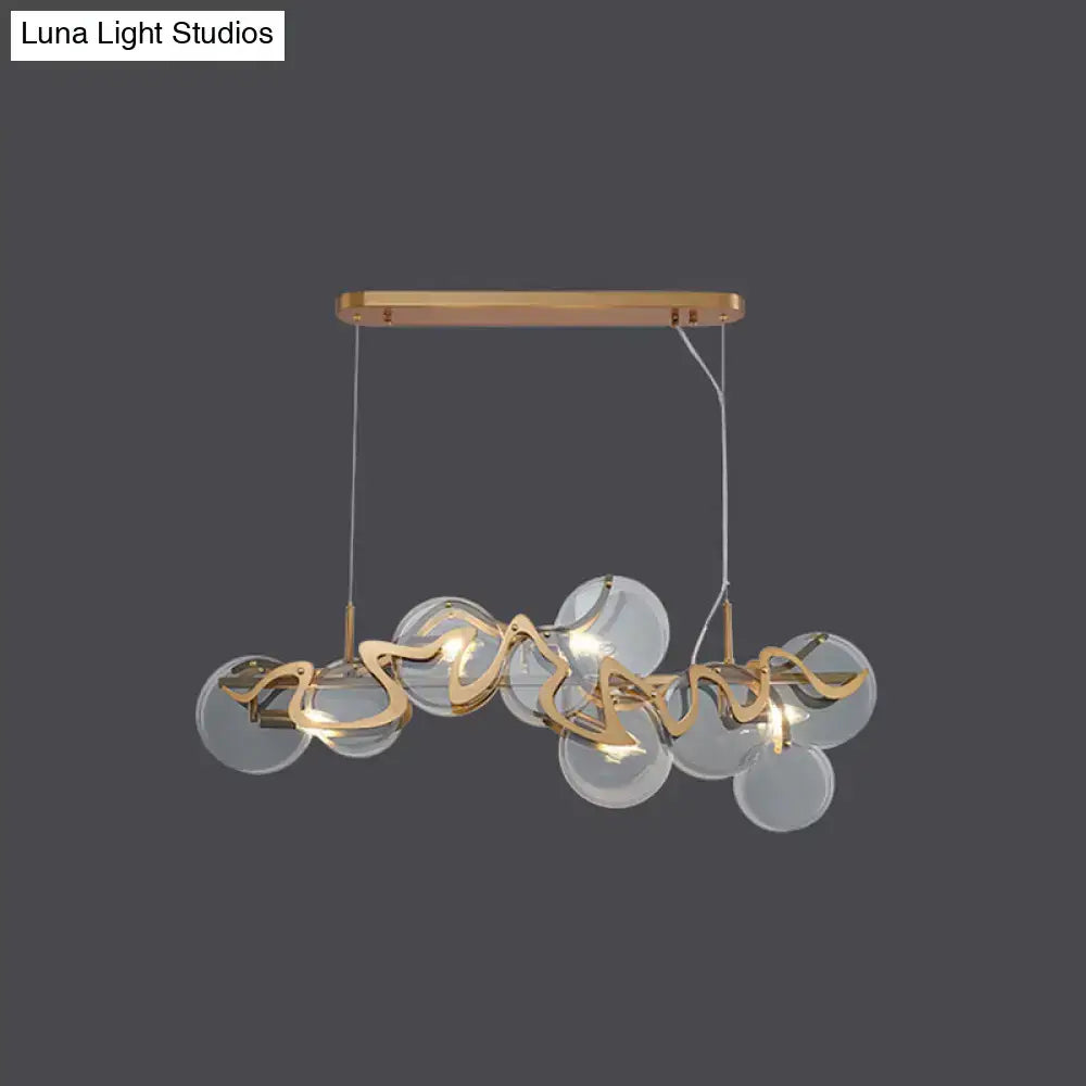 Postmodern gold and glass circle pendant light for dining room