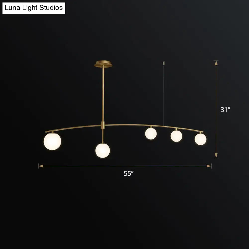 Postmodern gold pendant light with frosted white glass dining room