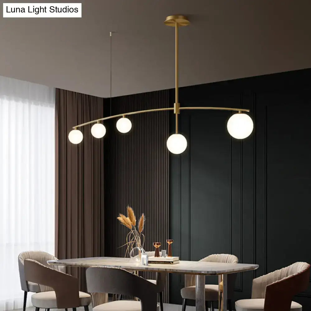 Postmodern gold pendant light with frosted white glass dining room