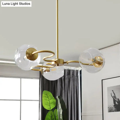 Modern brass 3-light glass globe flush mount for bedroom