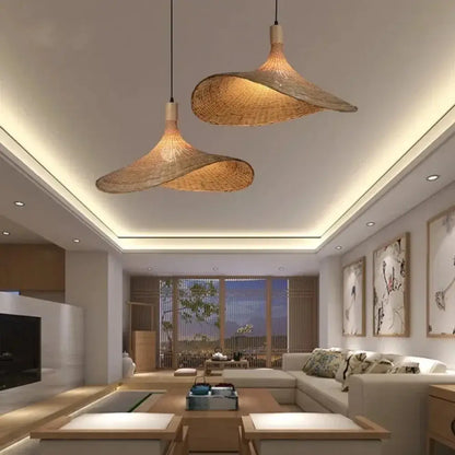 Woven golden brown rattan pendant light with dimmable bamboo shade dining room