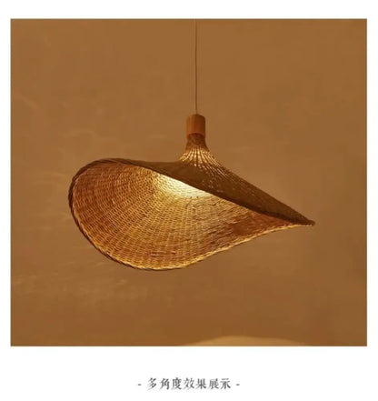 Woven golden brown rattan pendant light with dimmable bamboo shade dining room