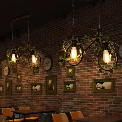 Industrial retro bicycle ceiling light with plant decor dining room