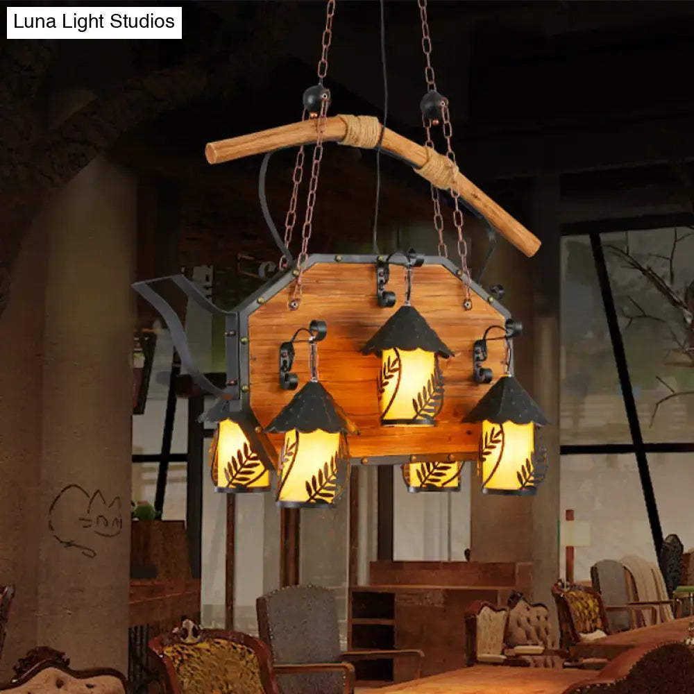 Rustic wood and black teapot light fixture clear glass dining room