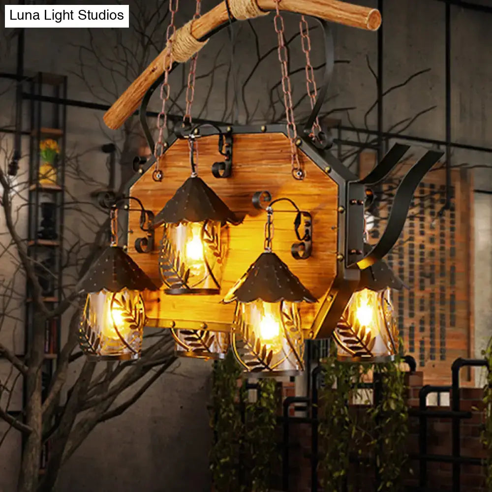 Rustic wood and black teapot light fixture clear glass dining room