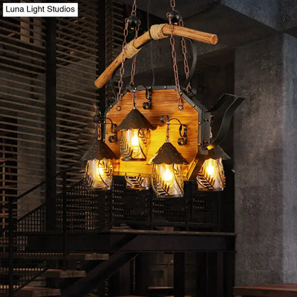 Rustic wood and black teapot light fixture clear glass dining room