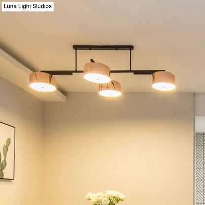Modern rose gold & black 4-light pendant – dining room light fixture