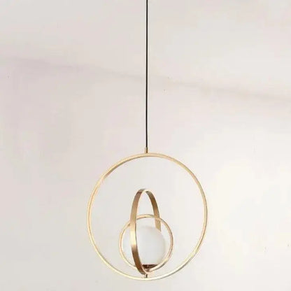 Modern rotating gold ring pendant light bedroom frosted glass globe