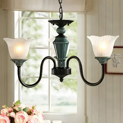 Rustic blackish green floral chandelier with frosted glass living room