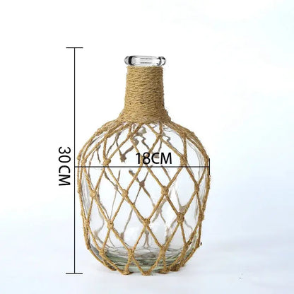 Rustic hanging glass vase with twine and metal handle – living room