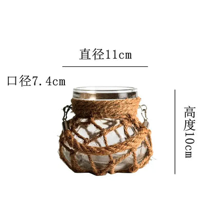 Rustic hanging glass vase with twine and metal handle – living room